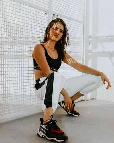 a-woman-wearing-black-sport